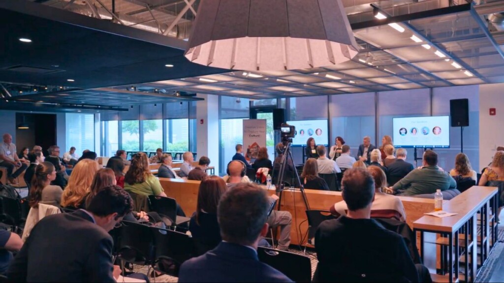 Photo of audience and speakers at an AMA Chicago Signature Speaker Series event, June 2025